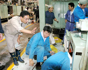 �@�B��g�ݕt�����ƈ��ɐ��������鉖��c��